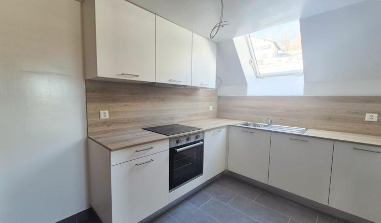 Chaleureux logement de 2.5 pièces, cuisine et salle de bains neuves - 1er loyer offert