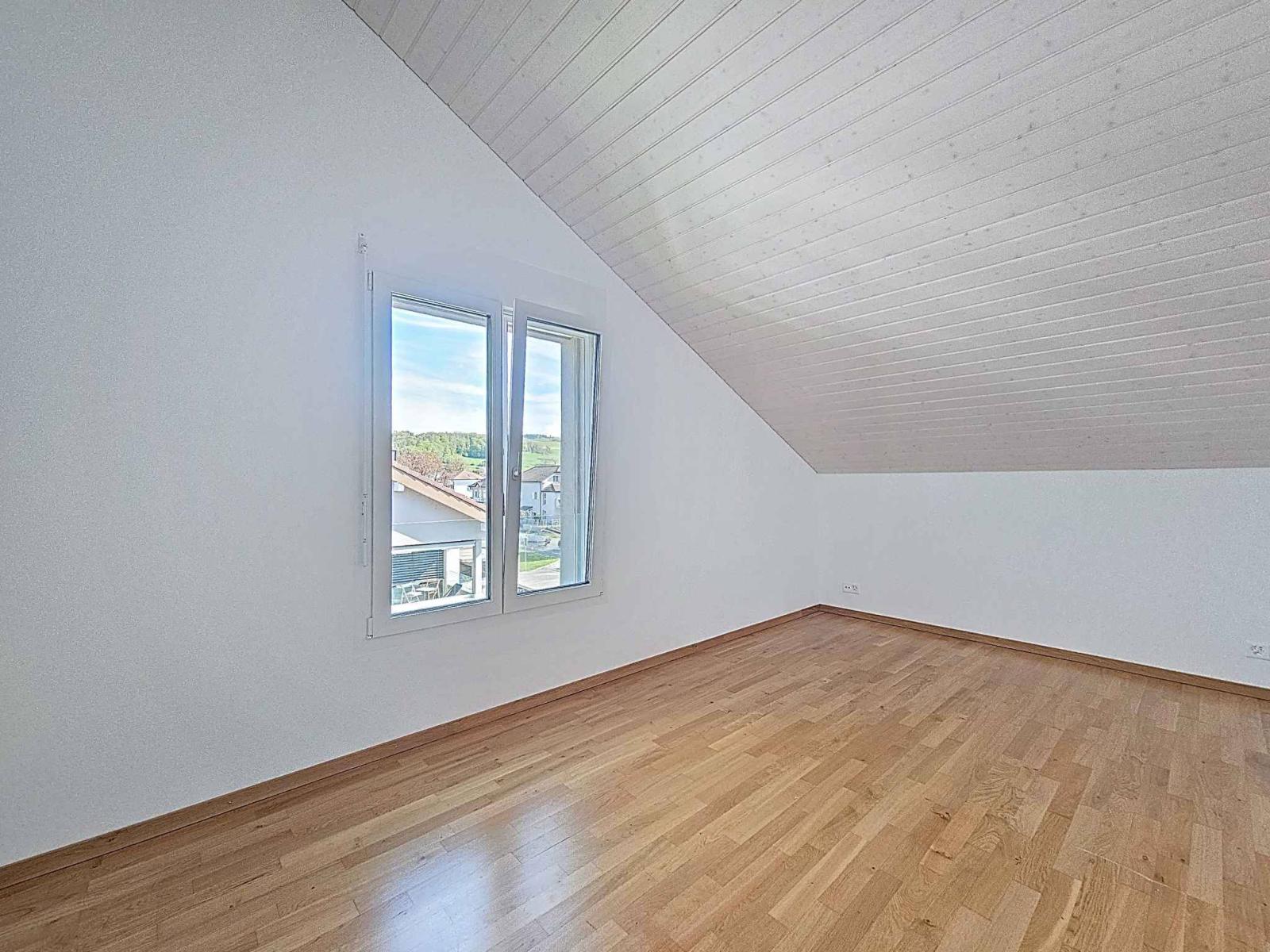 Appartement moderne de 3.5 pièces avec places de parc couvertes