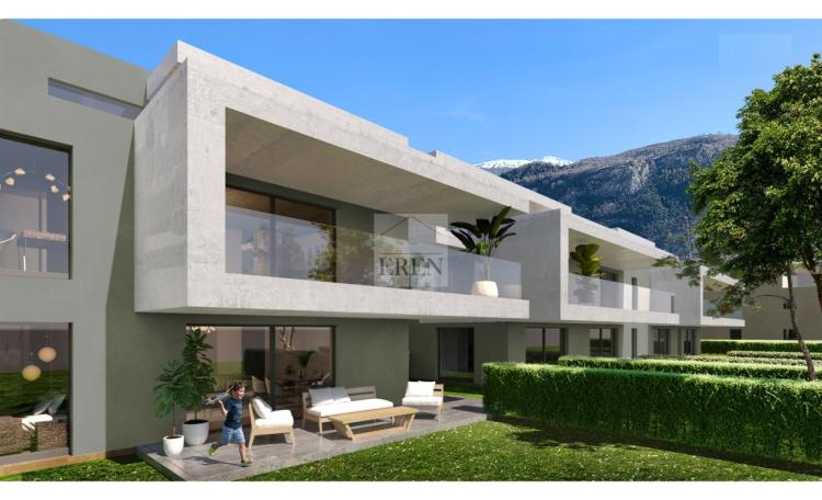 Appartement 2,5 pièces neuf avec terrasse de 15 m2 et jardin pelouse de 40 m2