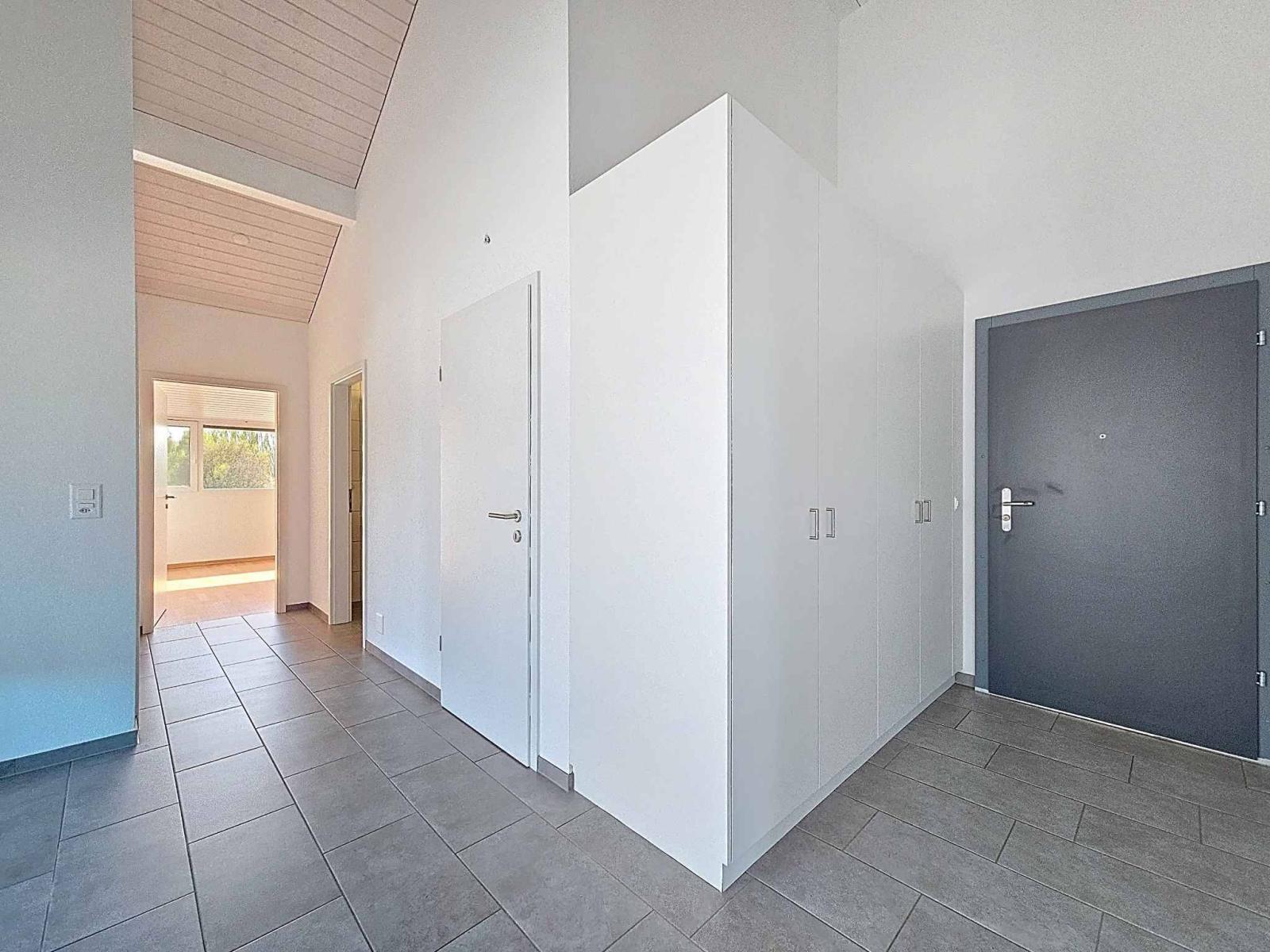 Appartement moderne de 3.5 pièces avec places de parc couvertes