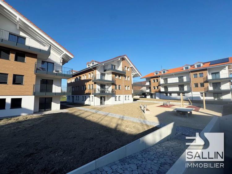 Appartement neuf de 3½ pces au 2ème étage avec pl. de parc intérieure