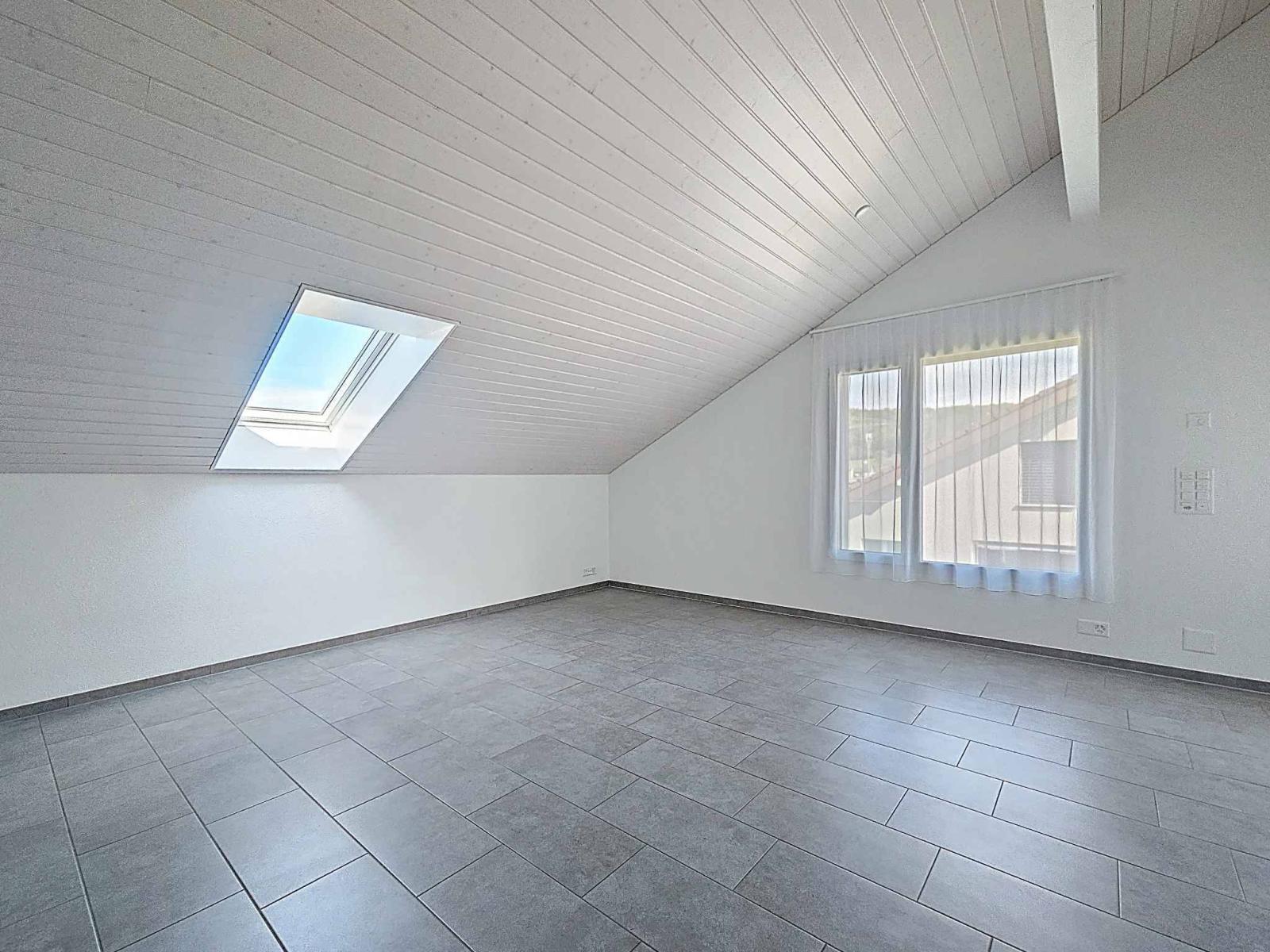Appartement moderne de 3.5 pièces avec places de parc couvertes
