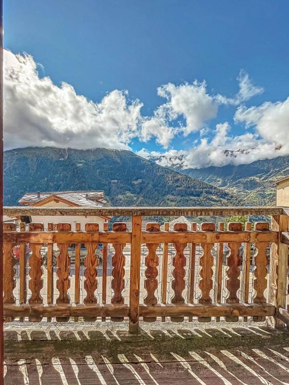 Appartement avec potentiel de rénovation et vue sur les montagnes