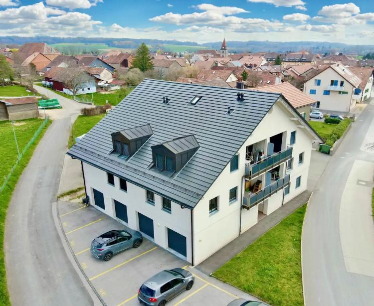 Modernes Wohngebäude mit 6 Wohnungen im Dorfzentrum