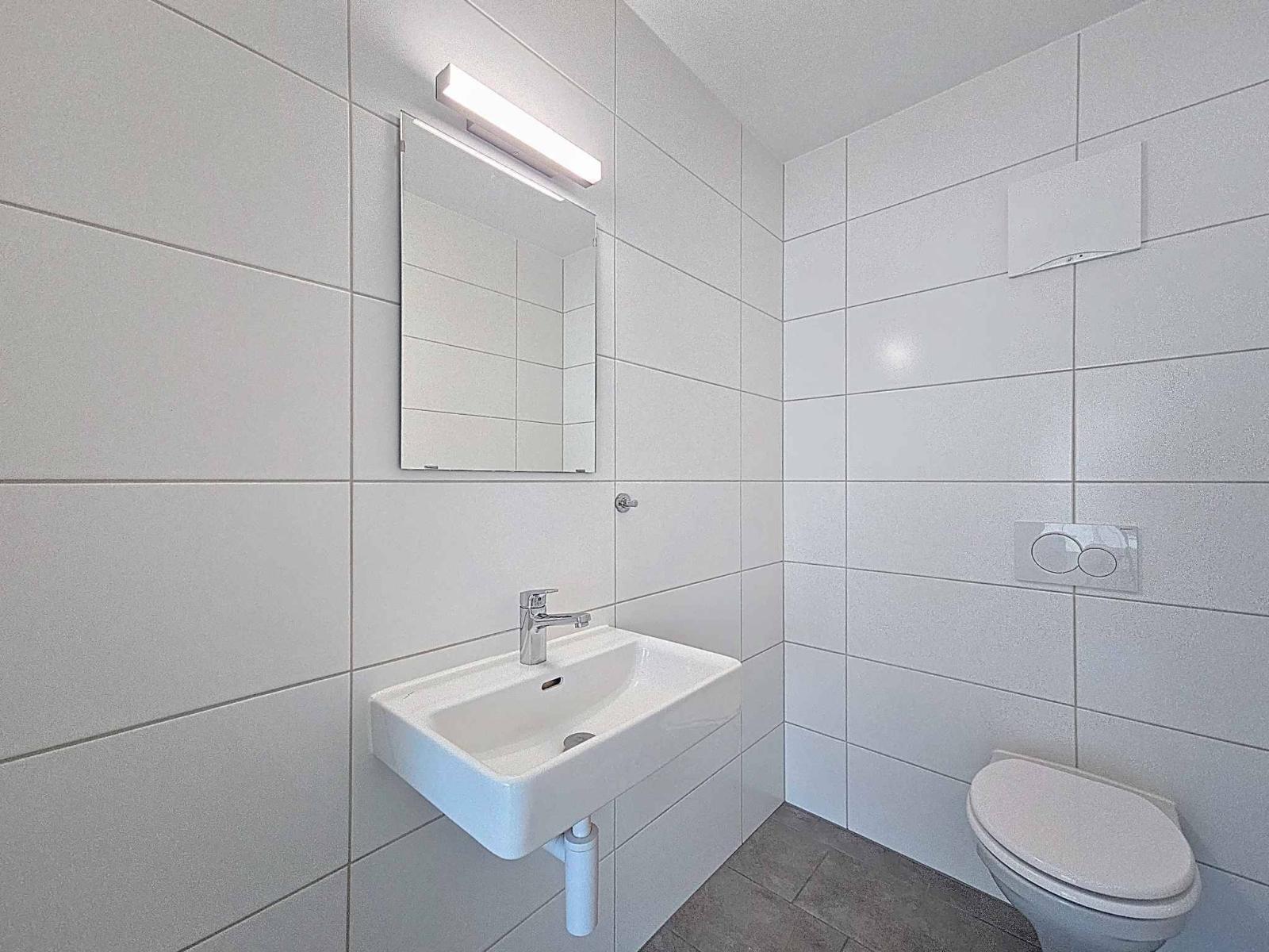 Appartement moderne de 3.5 pièces avec places de parc couvertes