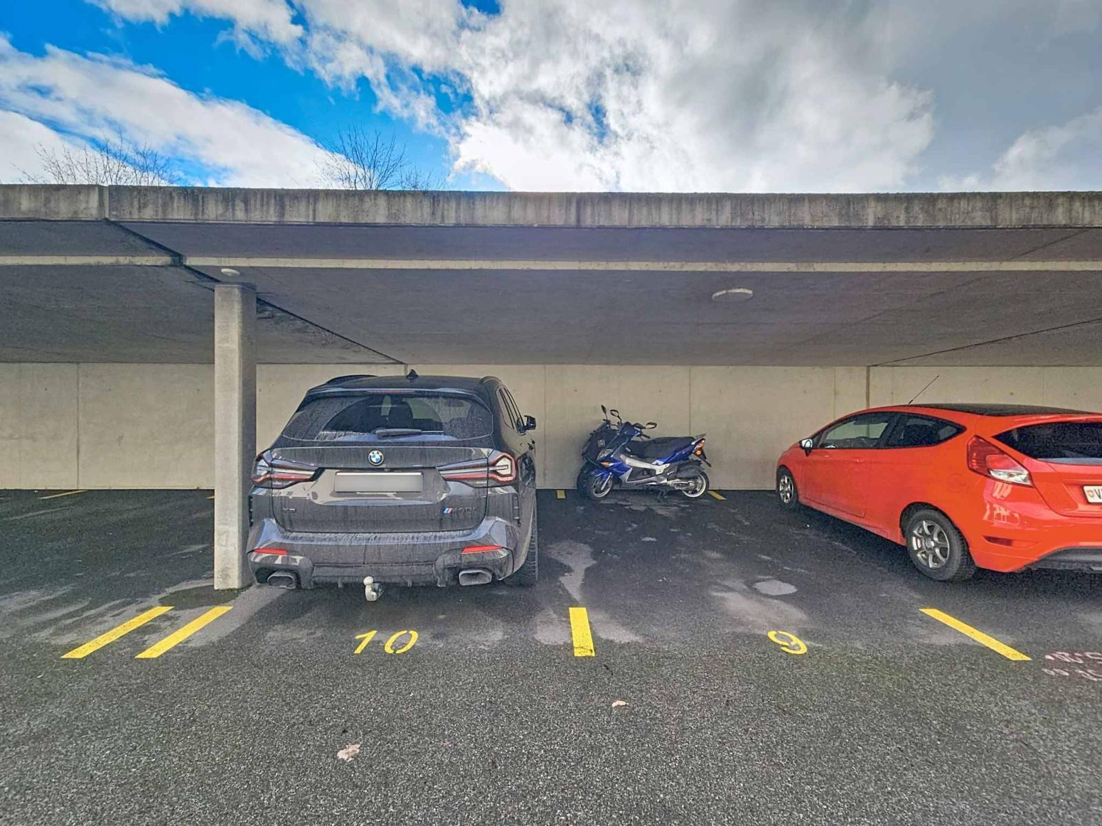 Appartement moderne de 3.5 pièces avec places de parc couvertes