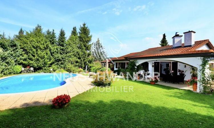 À Porrentruy villa de 7 pièces sur un vaste terrain boisé à vendre