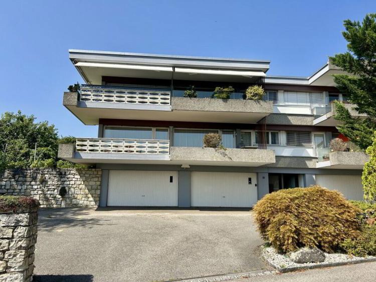 Magnifique avec grand balcon couvert et accès direct au jardin