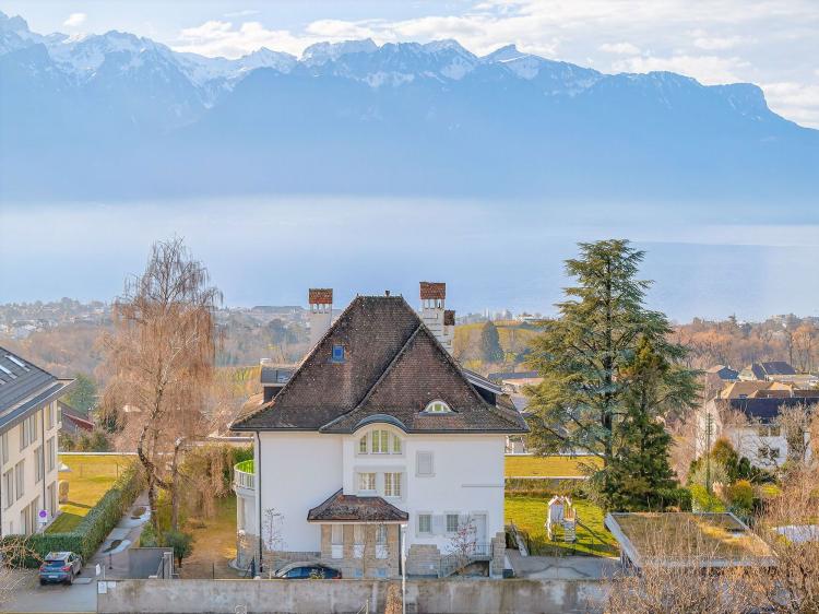 Un joyau rare : Demeure de maître avec vue panoramique sur le lac