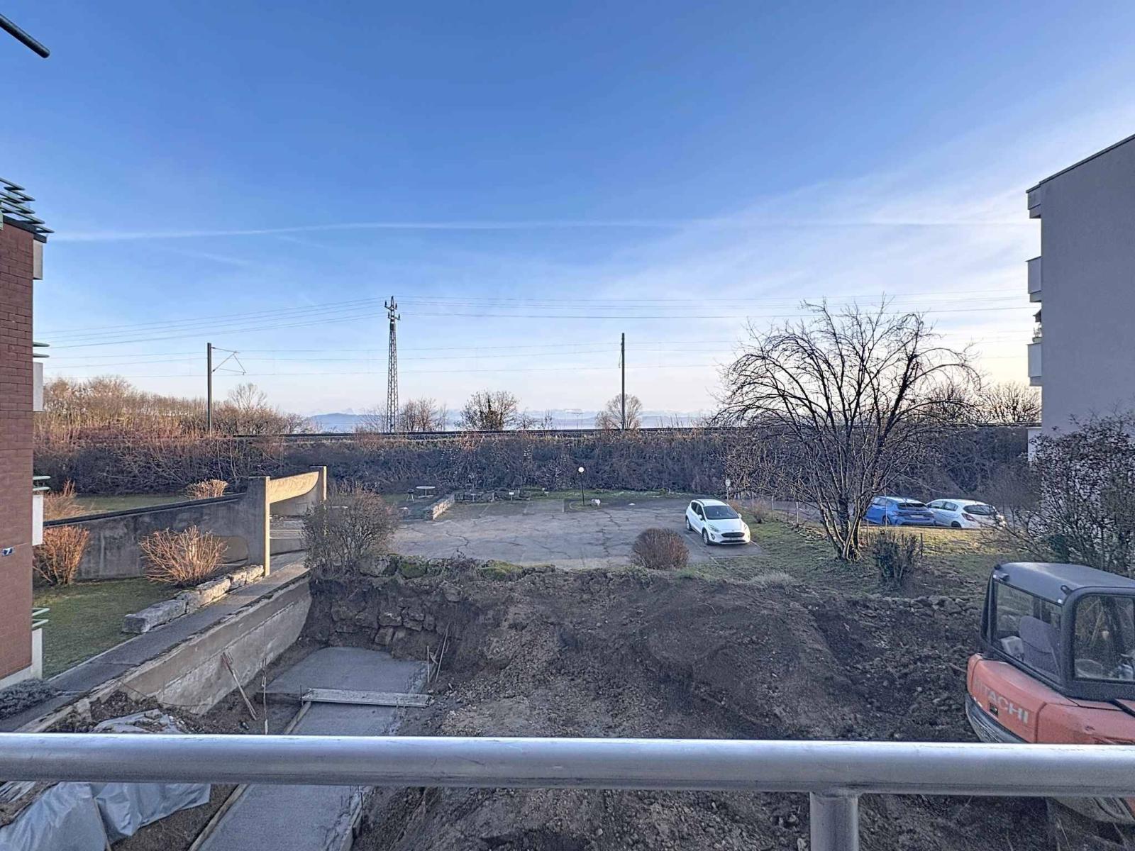 Élégant 3.5 pièces neuf avec deux espaces extérieurs