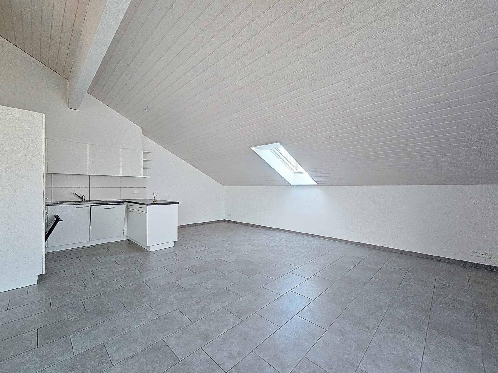 Appartement moderne de 3.5 pièces avec places de parc couvertes