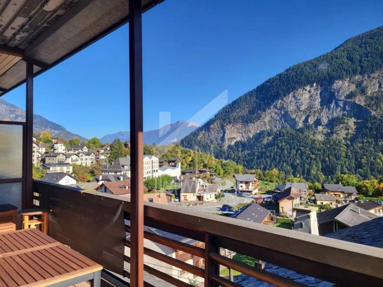 Appartement 2,5 P rénové, grande terrasse sud et véranda