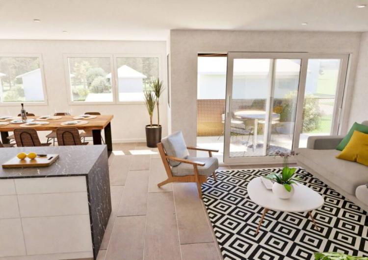 Magnifique appartement neuf de 4½ au rez supérieur avec 2 balcons, jardin privatif et vue dégagée