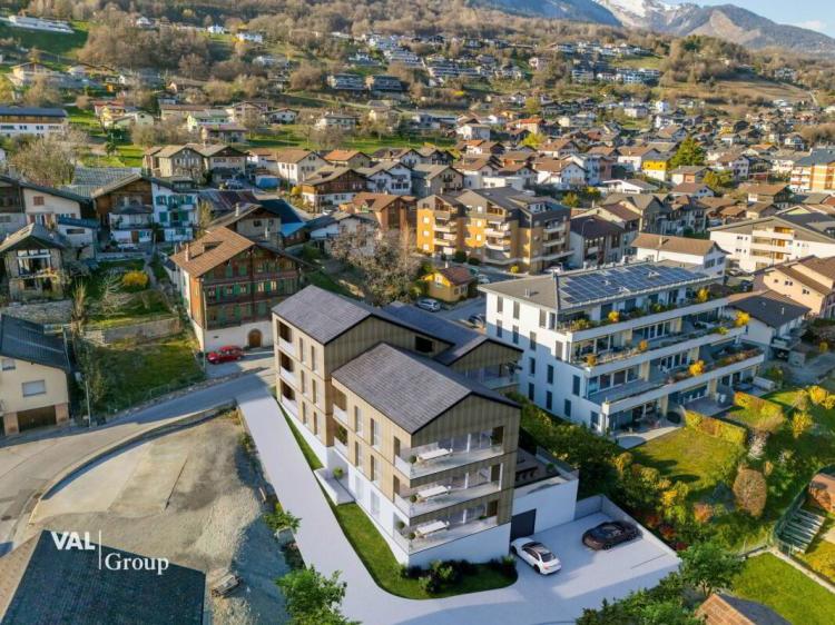 Spacieux appartement 3,5 pièces avec balcon - Un cadre paisible avec une belle vue