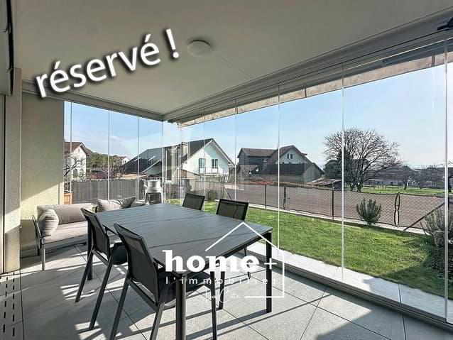 En exclusivité - Magnifique appartement avec véranda et jardin